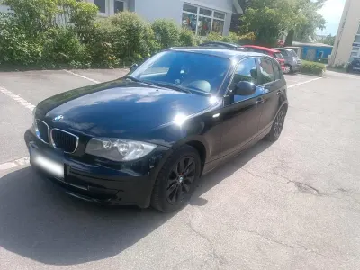 Gebraucht BMW 116 122 PS (89 kW) 2010 Schwarz Kleinwagen