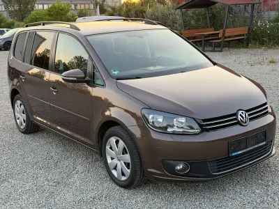 Gebraucht VW Touran Comfortline 105 PS (77 kW) 2013 Braun Van / Kleinbus