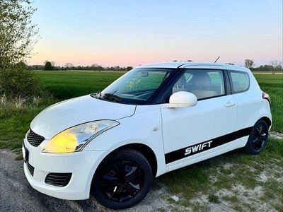 Second-hand Suzuki Swift Club 94 CP (69 kW) 2011 Alb Hatchback