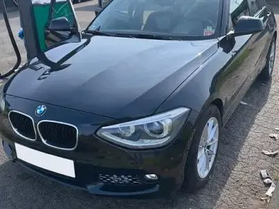 Usado BMW 116 Sport Line 136 CV (100 kW) 2012 Negro Utilitario