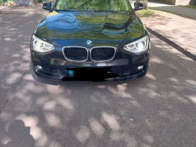 Gebraucht BMW 116 116 PS (85 kW) 2012 Schwarz Kleinwagen