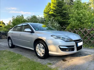Używany Renault Laguna III 110 KM (80 kW) 2012 Srebrny Sedan/Limuzyna