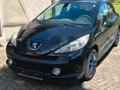 Gebraucht Peugeot 207 73 PS (53 kW) 2009 Schwarz Kleinwagen