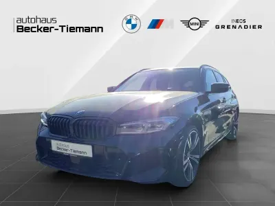 Second-hand BMW 320e M Sport 163 CP (119 kW) 2022 Negru Break