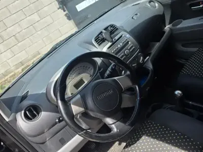 Gebraucht Daihatsu Sirion 91 PS (66 kW) 2008 Schwarz Kleinwagen