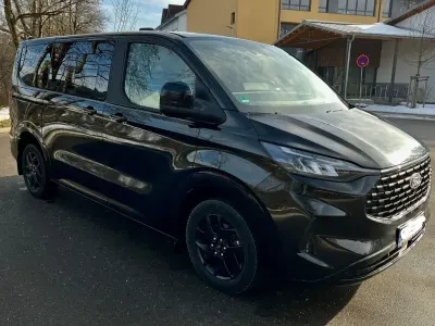 Gebraucht Ford Tourneo Titanium 170 PS (125 kW) 2024 Schwarz Van / Kleinbus