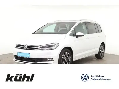 Gebraucht VW Touran Highline 150 PS (110 kW) 2025 Oryxweiß perlmutteffekt Van / Kleinbus