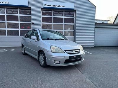Second-hand Suzuki Liana Club 90 CP (66 kW) 2004 Argintiu Berlinǎ
