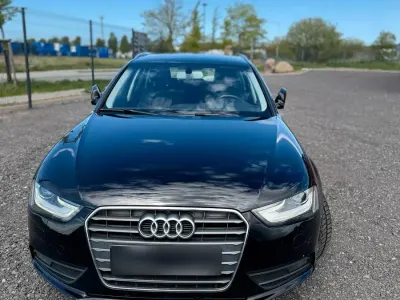 Używany Audi A4 Attraction 143 KM (105 kW) 2012 Czarny Kombi