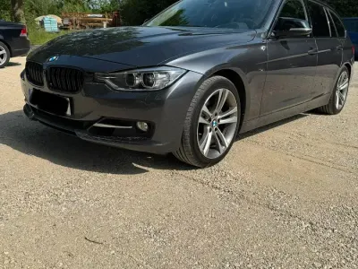Gebraucht BMW 330 Sport Line 258 PS (189 kW) 2012 Grau Kombi