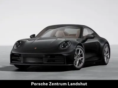 Gebraucht Porsche 911 Carrera 394 PS (289 kW) 2025 Tiefschwarzmetallic Coupé