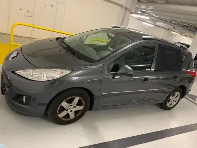 Gebraucht Peugeot 207 Premium 95 PS (69 kW) 2012 Grau Kombi