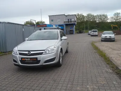 Używany Opel Astra 116 KM (85 kW) 2010 Srebrny Sedan/Limuzyna