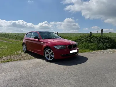 Używany BMW 116 Advantage 122 KM (89 kW) 2010 Czerwony Hatchback