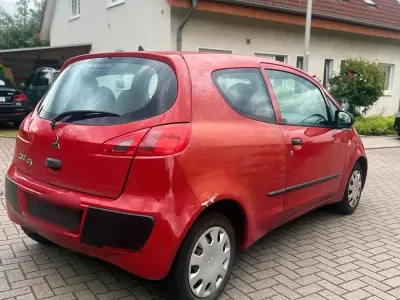 Gebraucht Mitsubishi Colt 75 PS (55 kW) 2005 Rot Kleinwagen