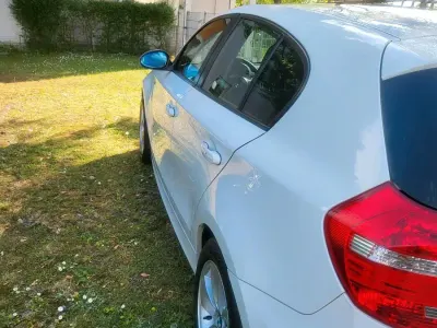 Używany BMW 116 Lifestyle 122 KM (89 kW) 2008 Biały Hatchback