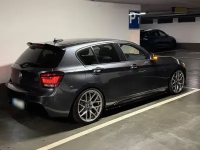 Gebraucht BMW 118 Sport Line 170 PS (125 kW) 2011 Schwarz Kleinwagen