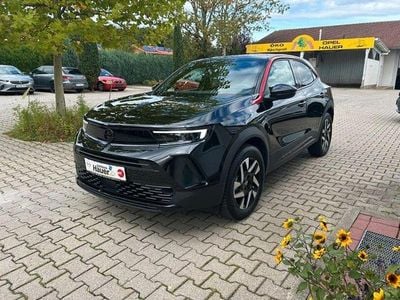 Gebraucht Opel Mokka-e 100 kW (136 PS) 2023 Karbonschwarz SUV