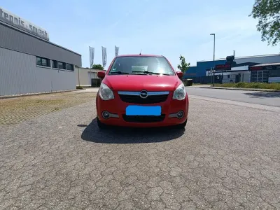 Używany Opel Agila 68 KM (50 kW) 2014 Czerwony Hatchback