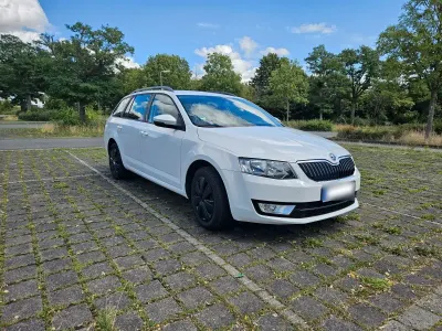 Gebraucht Skoda Octavia Ambition 105 PS (77 kW) 2013 Weiß Kombi