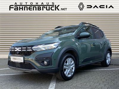 Gebraucht Dacia Sandero Expression 101 PS (74 kW) 2023 Safarigrüngrau Kleinwagen