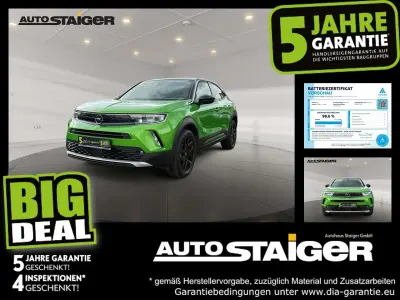 Gebraucht Opel Mokka-e Elegance 100 kW (136 PS) 2022 Matcha green/ikone gruen SUV