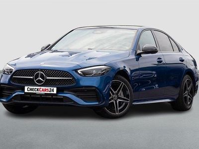 Blau Gebraucht 2024 Mercedes C300e AMG line Limousine | 52.689 €