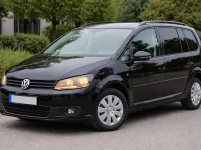 Gebraucht VW Touran 105 PS (77 kW) 2010 Schwarz Van / Kleinbus