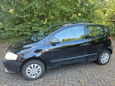 Gebraucht VW Fox 74 PS (54 kW) 2006 Schwarz Kleinwagen