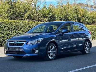 Second-hand Subaru Impreza 114 CP (83 kW) 2013 Albastru Berlinǎ