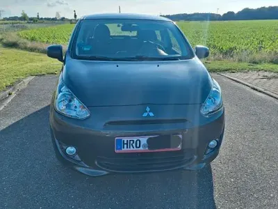 Gebraucht Mitsubishi Space Star 71 PS (52 kW) 2014 Grau Van / Kleinbus
