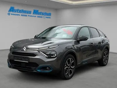 Gebraucht Citroën e-C4 Shine 100 kW (136 PS) 2023 Lackierung platiniumgrau/typ Limousine