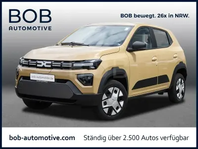 Gebraucht Dacia Spring Expression 33 kW (45 PS) 2025 Safaribeige (beige) Kleinwagen