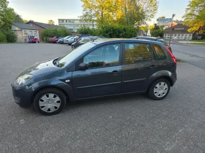 Gebraucht Ford Fiesta 69 PS (50 kW) 2007 Orange Kleinwagen