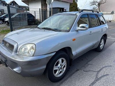 Second-hand Hyundai Santa Fe GLS 173 CP (127 kW) 2004 Argintiu SUV