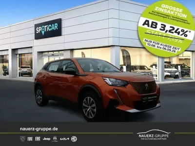 Gebraucht Peugeot e-2008 Active 100 kW (136 PS) 2022 Orange SUV
