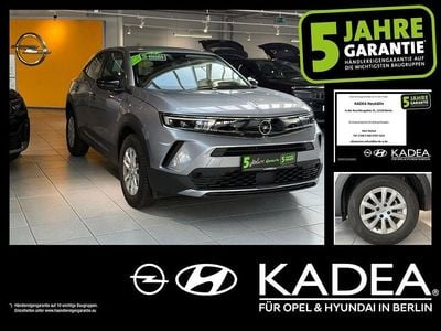 Gebraucht Opel Mokka 131 PS (96 kW) 2023 Kontrast grau/quarz silber (metallic) SUV