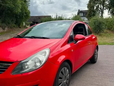 Gebraucht Opel Corsa 90 PS (66 kW) 2009 Rot Kleinwagen