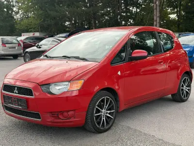 Gebraucht Mitsubishi Colt 75 PS (55 kW) 2011 Rot Kleinwagen