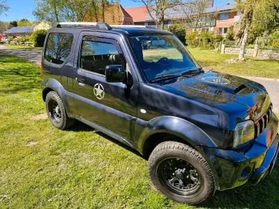 Second-hand Suzuki Jimny 83 CP (61 kW) 2013 Negru SUV