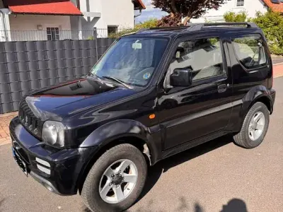 Używany Suzuki Jimny 86 KM (63 kW) 2011 Czarny SUV