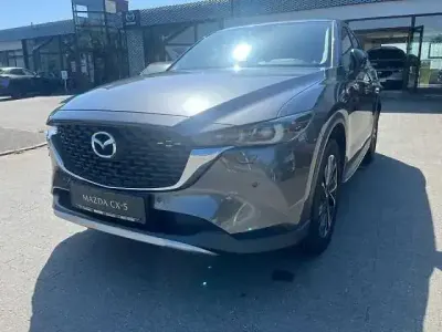 Gebraucht Mazda CX-5 Newground 194 PS (142 kW) 2023 Machine grey (metallic) SUV