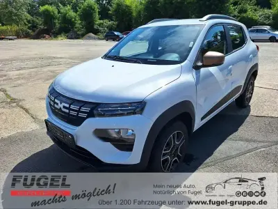 Gebraucht Dacia Spring Extreme 47 kW (65 PS) 2023 Kaolinweiß Kleinwagen