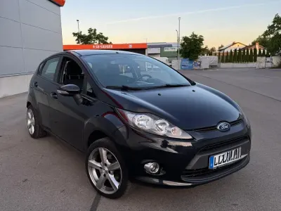 Gebraucht Ford Fiesta 95 PS (69 kW) 2012 Schwarz Limousine