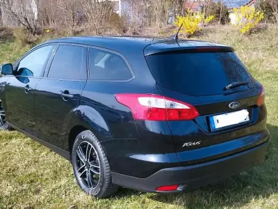 Używany Ford Focus 116 KM (85 kW) 2014 Czarny Kombi