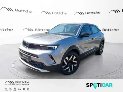 Gebraucht Opel Mokka Elegance 131 PS (96 kW) 2021 Kontrast grau/quarz silber SUV