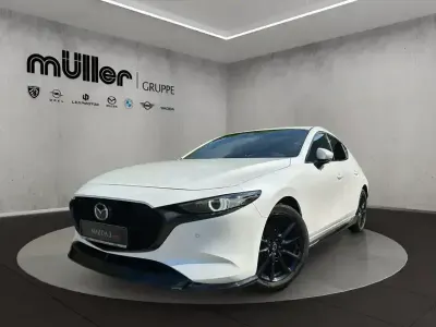 Używany Mazda 3 Exclusive 186 KM (136 kW) 2023 Biały Sedan/Limuzyna