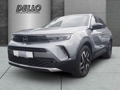 Gebraucht Opel Mokka Elegance 131 PS (96 kW) 2023 Kontrast grau/quarz silber SUV