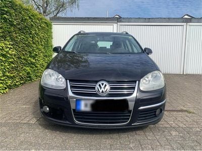 Second-hand VW Golf V 140 CP (102 kW) 2008 Negru Break