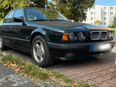 Gebraucht BMW 520 150 PS (110 kW) 1995 Grün Limousine